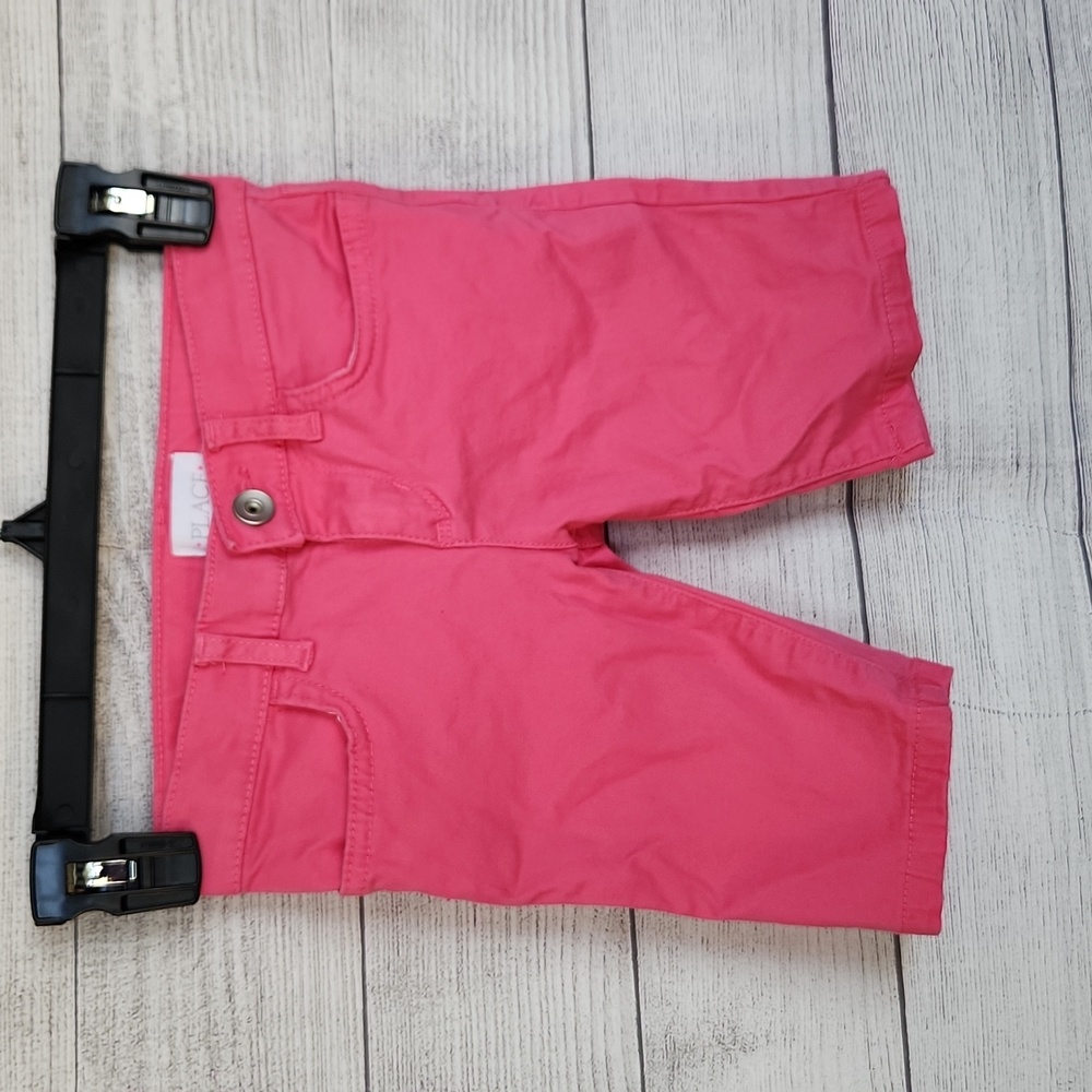 Place pink shorts